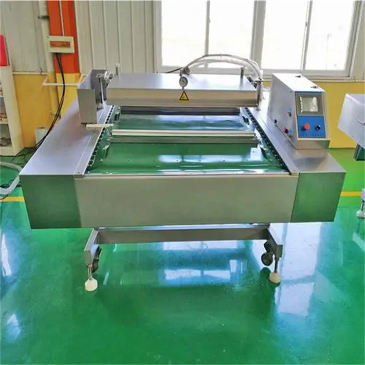 1100型连续滚动真空包装机干湿两用自动真空包装机玉米真空包装机