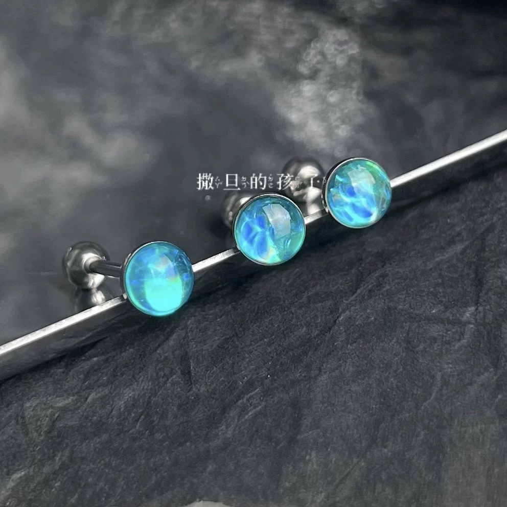 Silver pointed spike labret stud material detail