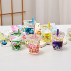 アクリル流砂瓶入油キーホルダープレゼント卸売りかばんペンダントかわいいカラービーズ流砂ペンダントキーホルダー