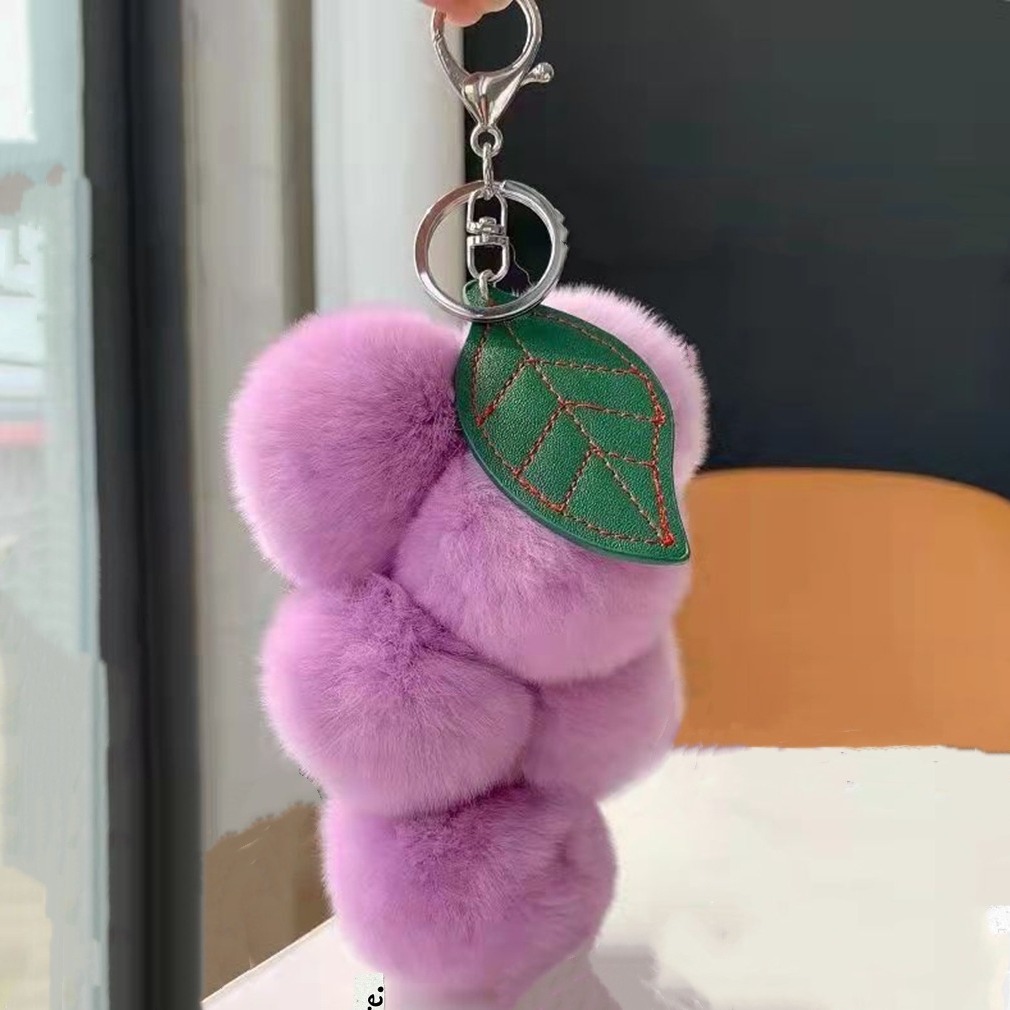Real Rex conejo piel pequeña uva adornos ins Internet celebridad lindo bola de peluche coche llavero colgante accesorios para las mujeres