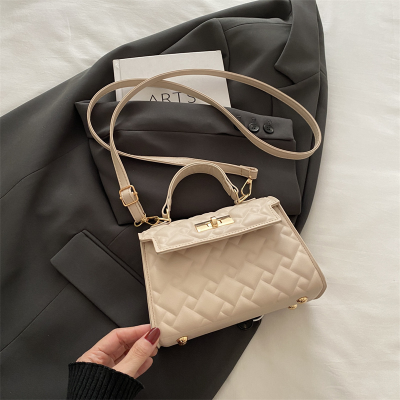 Bolso de mano con cerradura de cercanías para mujer 2024 otoño e invierno nuevo estilo salvaje ins diseño de nicho bolso salvaje ins Kelly