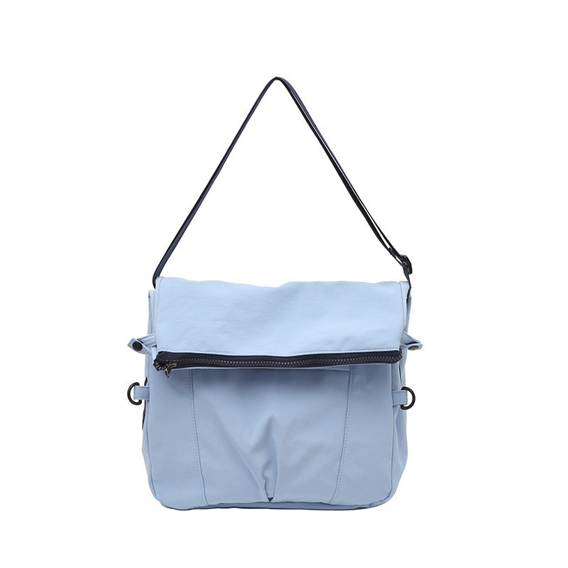 Bolso de lona de moda coreana 2025 verano nuevo bolso femenino estilo universitario bolso de hombro casual bolso de mensajero de gran capacidad marea