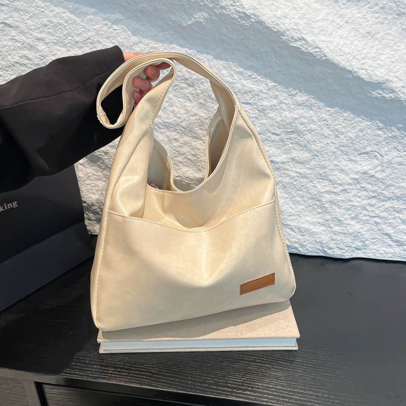 Bolsa de mano retro de gran capacidad coreana nuevo estilo perezoso estilo minimalista para el trabajo de los estudiantes de clase en la mochila