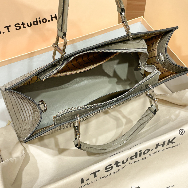 Hong Kong Håndholdt Tote i ægte læder til kvinder med stor kapacitet efterår/vinter Crossbody-taske 2023 Ny_voghion.com