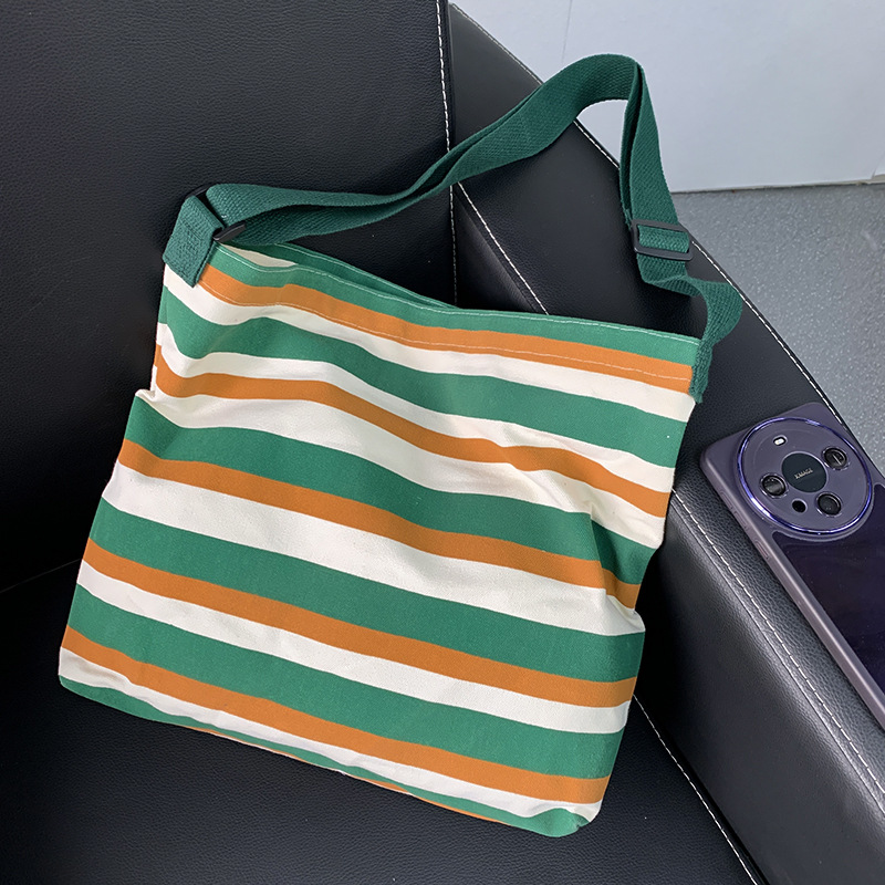 Nuevo Cruz-cuerpo bolsa de lona femenina de un solo hombro estudiante clase libro bolsa Bolsa de Comercio Exterior bolsa de la raya