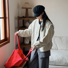 スタンドカラーのコート2025春の新型シンプルでゆったりした長袖のジャケットの女性ファッションに合わせて野球服85115