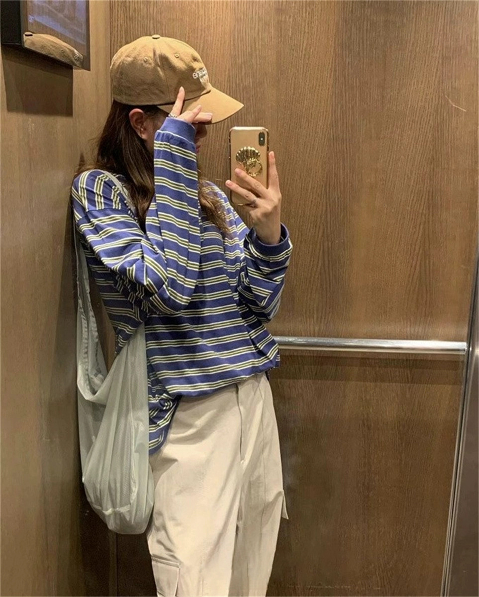 今秋の2025年新作韓国東大門カジュアル年齢軽減コントラストストライプルーズ長袖Tシャツ