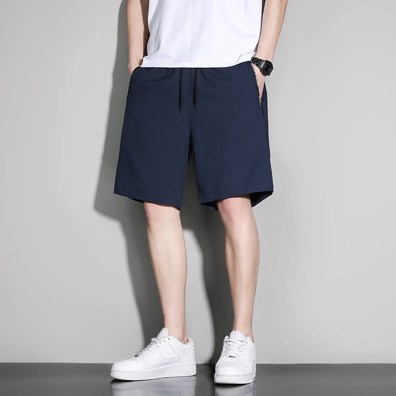 Pantalones cortos de moda para hombres de verano, seda de hielo, estilo fino, nuevos pantalones casuales sueltos de secado rápido para hombres, pantalones de cinco puntos, pantalones deportivos