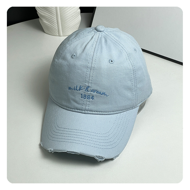 agujero nuevo sombrero de béisbol bordado de letras mujer simple cara pequeña gorra de lengua de goma ancha primavera y verano sombrero de pareja hombre