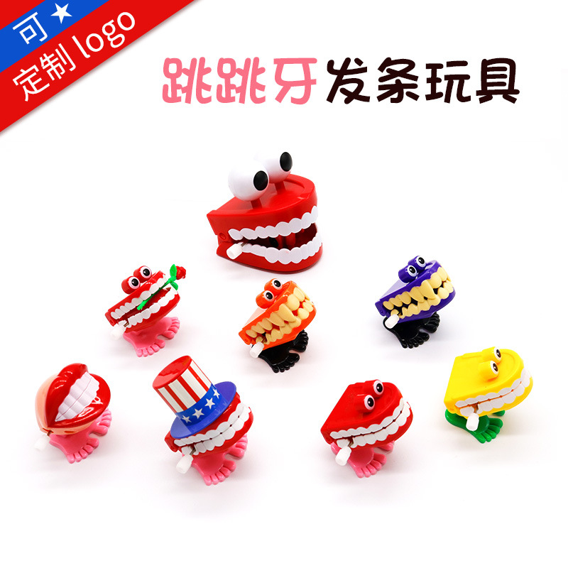 Juguetes dentales dientes de salto juguetes para niños juguetes de relojería dientes en forma de dientes saltando Rana regalos de jardín de infantes