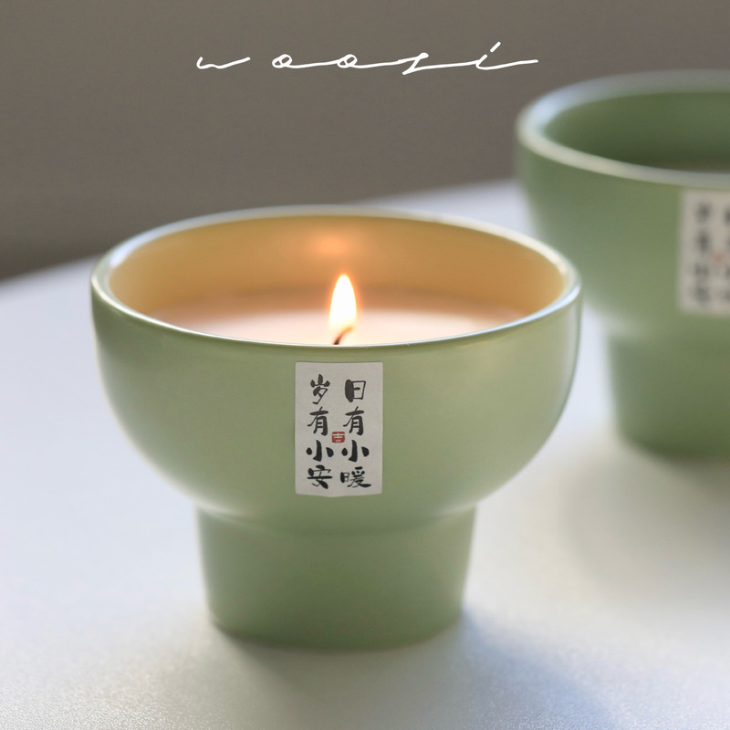 There are small warm tea fragrance candles matcha green tall ceramic smokeless soybean wax Longjing tea fragrance essential oil