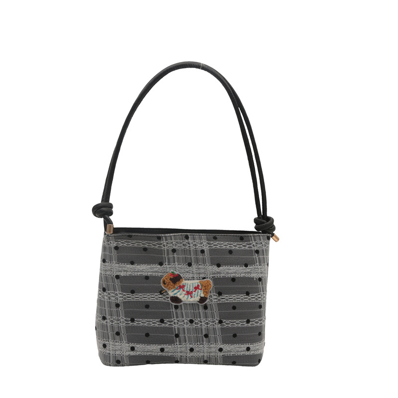 Bolsa de lona popular de este año para mujeres 2024 nuevo bolso de balde de verano de gran capacidad de alta calidad sensación de mochila de viaje