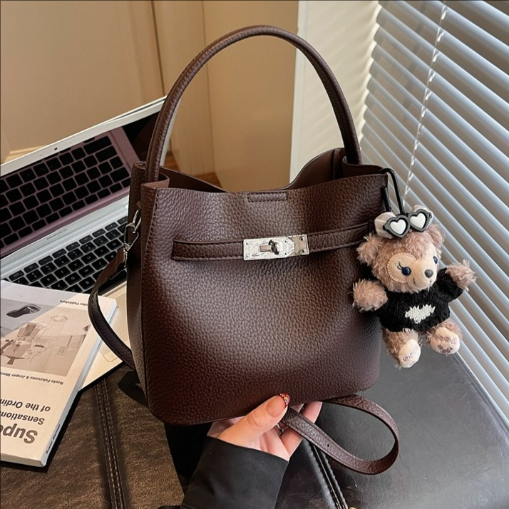 Bolso de mano de alta sensación para mujeres 2025, nueva moda versátil bolso de mochila de gran capacidad de viaje a casa bolso de cubo