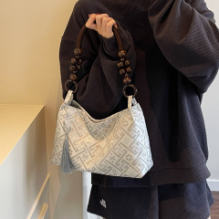 秋冬新作ファッションバッグ、新中式風、国風、脇に挟むタイプ、女性用、多用途、個性的なデザイン、高級感、ハンドバッグ、ショルダーバッグ