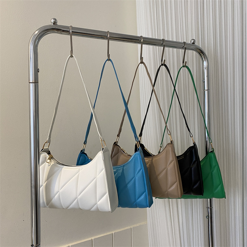 2023 verano nueva moda Moda retro textura bolsa de axilas simple bolsa de palo francés bolsa de hombro Portátil Bolsa de las mujeres