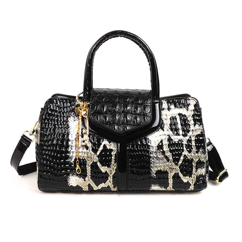 Europa y América retro transfronterizos bolsas de madres de mediana edad bolsas de Boston estampado de piel de serpiente atmósfera contraste de color inclinado de hombro bolsas de tote para mujeres