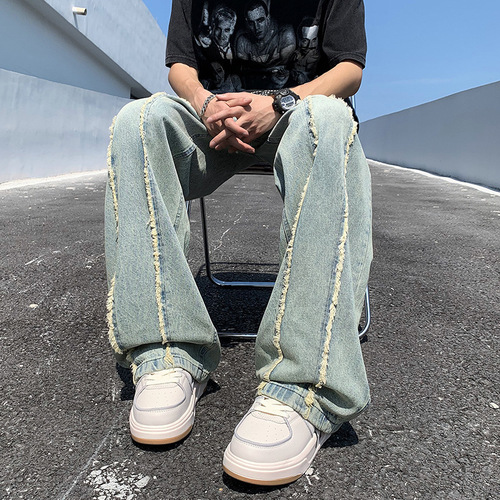 Yellowish-brown wool denim jeans for men, featuring a high-street vibe and an American-style trendy brand design—summer edition, effortlessly cool, with a relaxed, loose fit and straight, wide-leg silhouette.