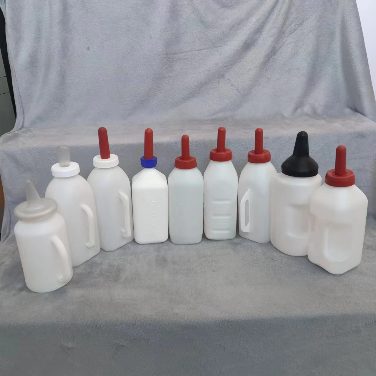 2L 2L veterinaria ternero botella de alimentación cabeza de leche de goma rojo pezón vaca botella de alimentación mango sólido botella de alimentación de gran capacidad