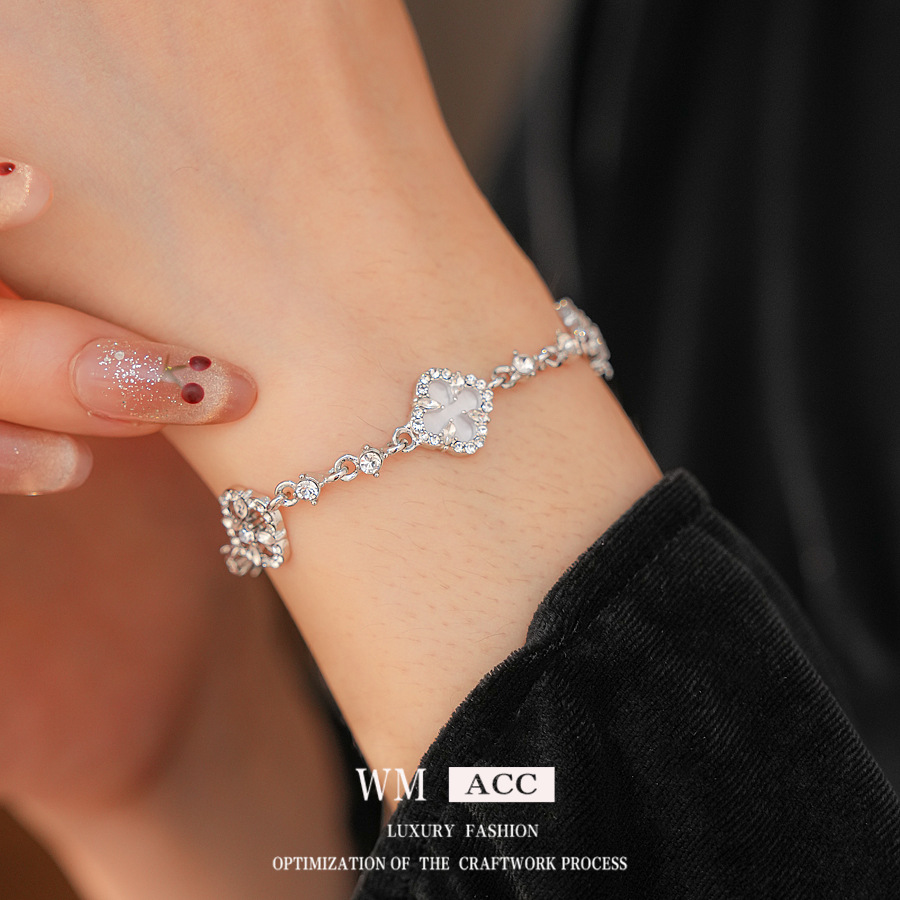Zircón ultra brillante flor de diamante hueco pulsera ligera lujo de alto nivel sensación de diseño de pulsera delicada sensación de nicho al por mayor