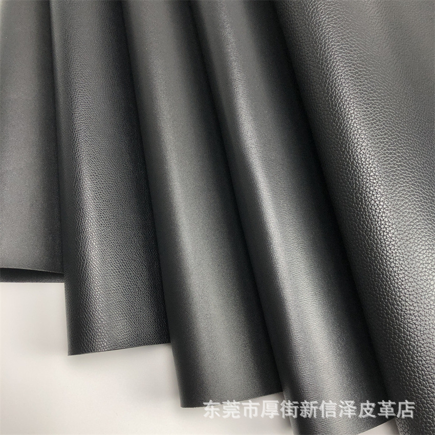 厂家批发零售双面革PVC皮革 荔枝纹小牛纹石头纹餐垫手袋箱面料