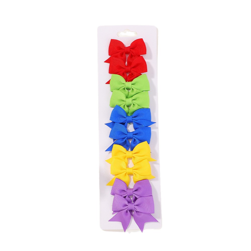 Juego de horquillas con lazo de cola de milano para niños de estilo caliente de Amazon, lindo y versátil, horquilla diaria para niñas europeas y americanas 323