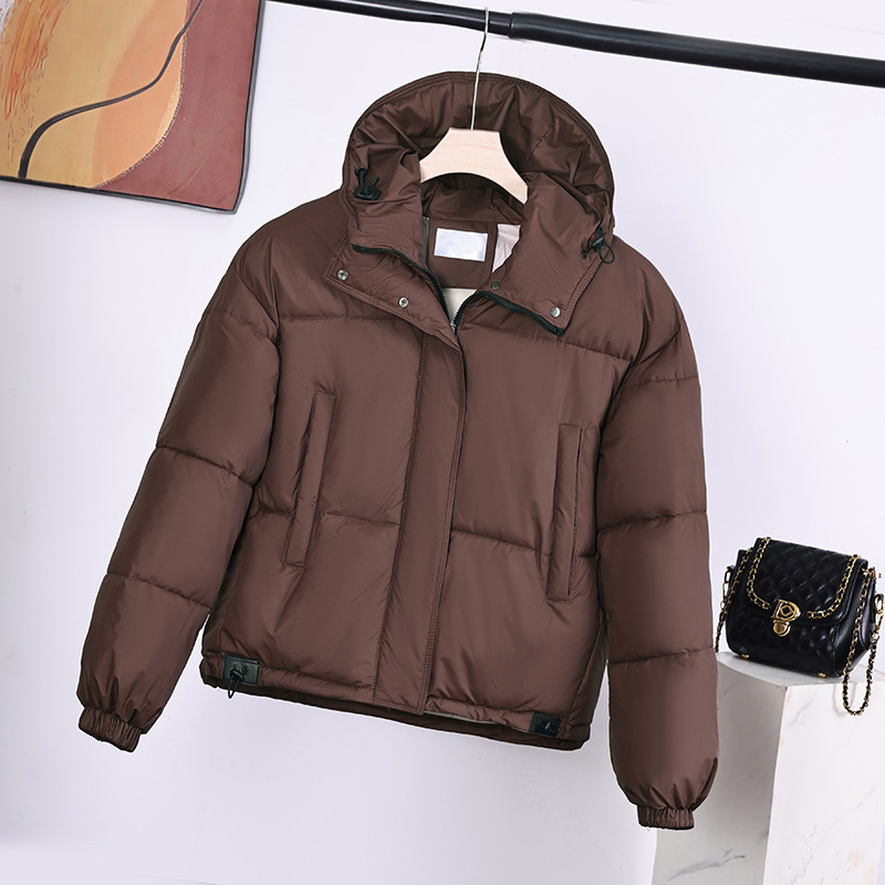 2025 nueva mujer invierno corto algodón ropa de algodón estilo coreano de diseño de moda suelta y gruesa chaqueta caliente de moda