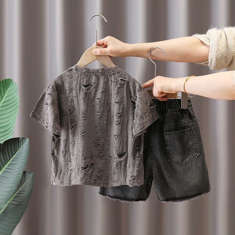 7133 traje de verano para niños ropa coreana de manga corta para niños camiseta hueca de verano pantalones cortos de mezclilla de dos piezas de verano