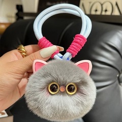 かわいいウサギの毛のひもの小さい猫の車のキーはぬいぐるみのカバンを掛けてプレゼントを飾ります。