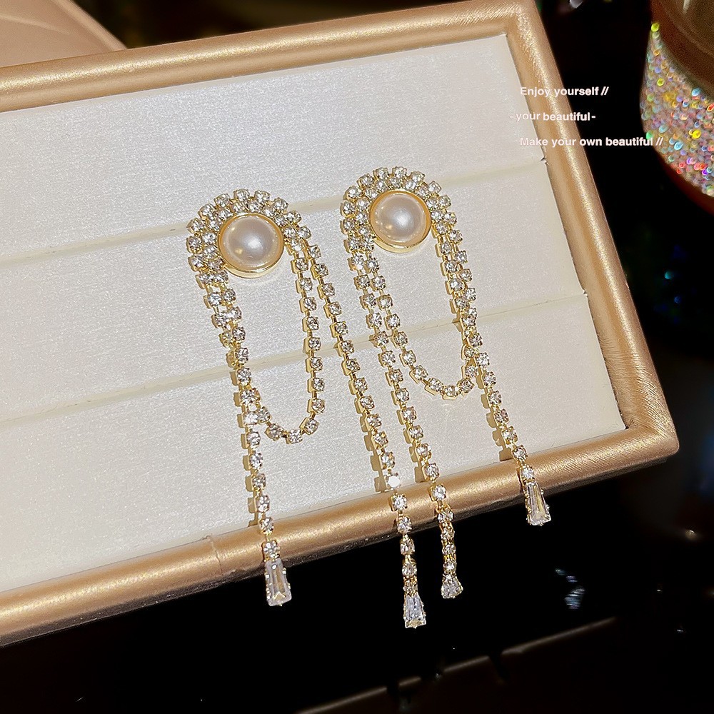 S925 aguja de plata elegante borla pendientes de alta gama simple cara de adelgazamiento pendientes de todo fósforo estilo coreano nuevos pendientes de moda al por mayor