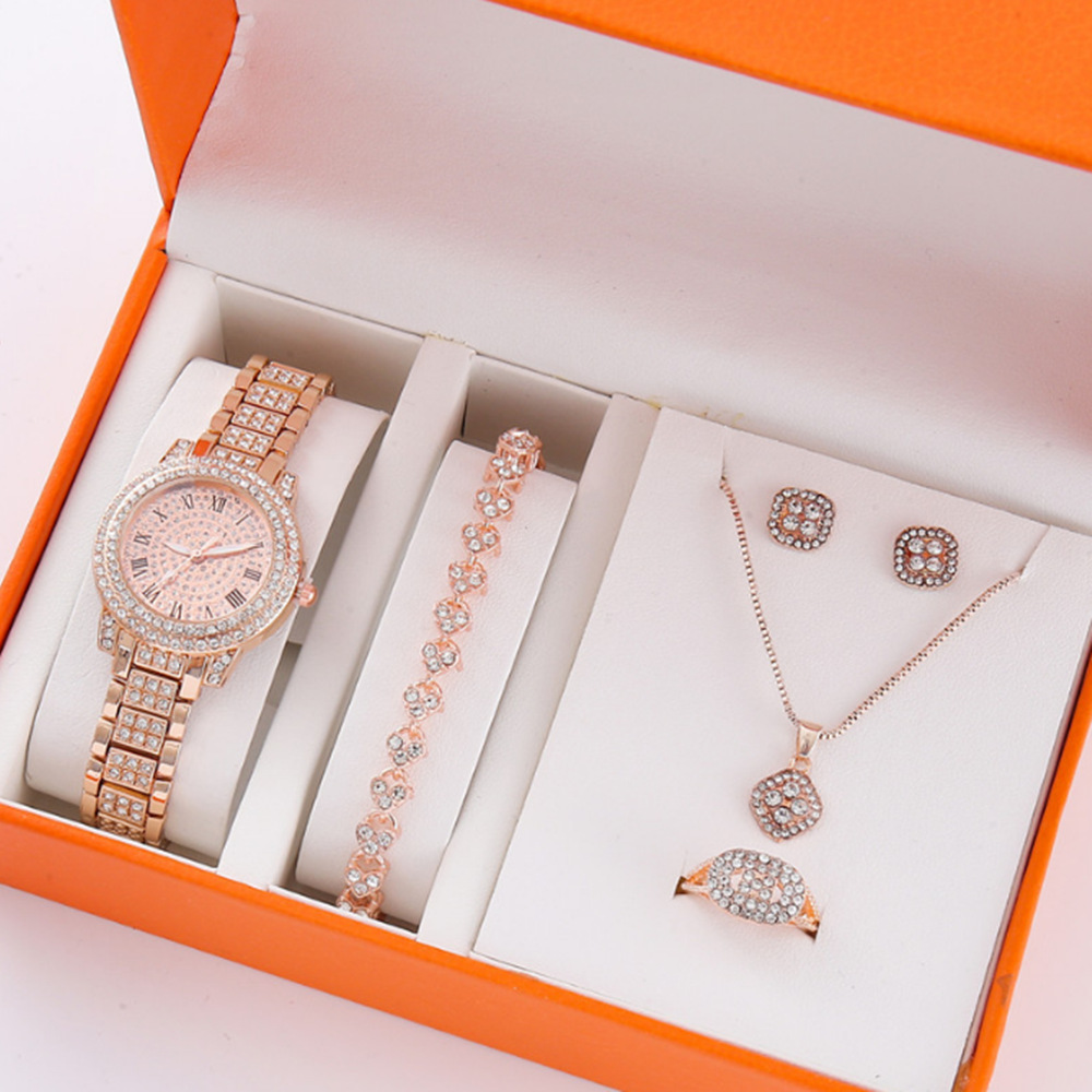 Nuevo producto para mujer 5pcs/set moda de nicho todo fósforo falso traje de reloj de cuarzo con cinturón de acero de tres ojos