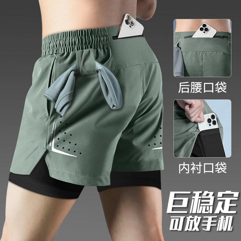 Light blue men's sports shorts for running and marathon with zipper pocket for phone storage, quick-dry lining, three-quarter length