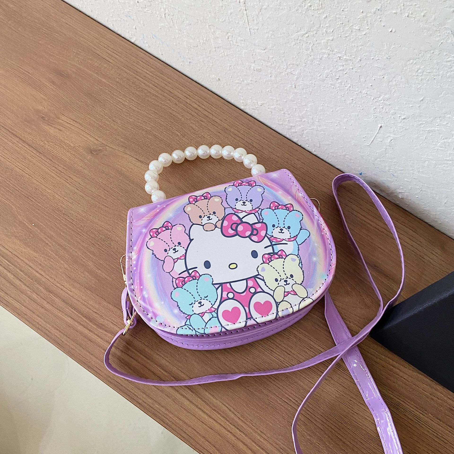 2024 nueva bolsa de hombro para niños princesa Elsa dibujos animados Yue Gui perro coreano nicho perla bolsa de mano inclinada