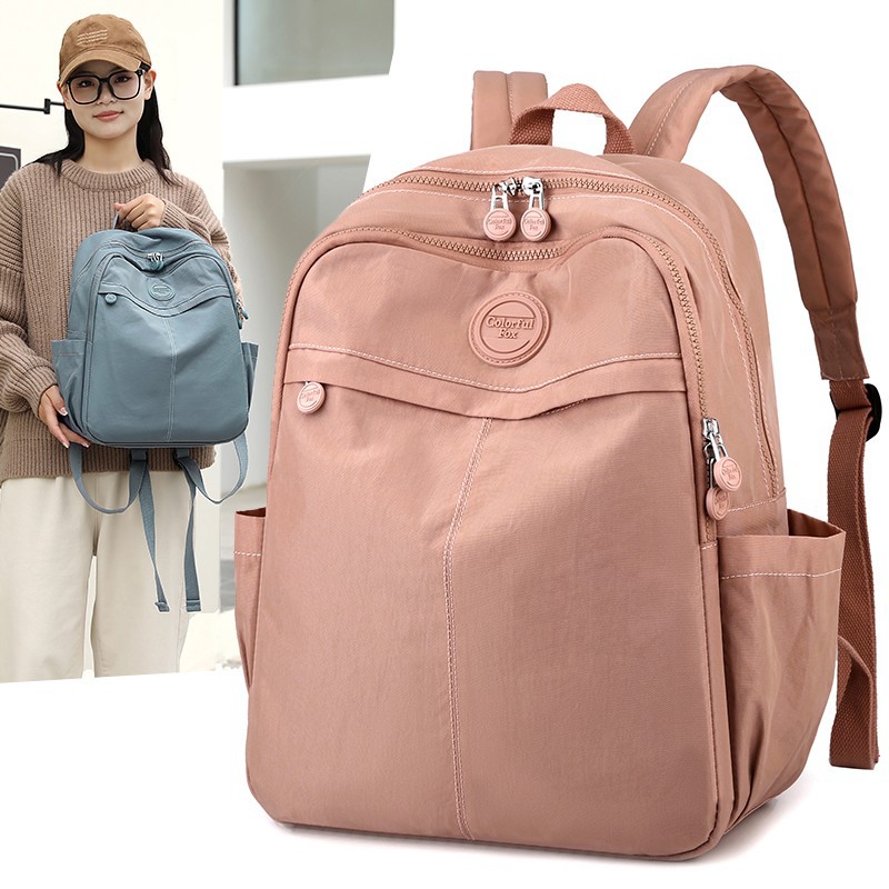 Nueva mochila de gran capacidad para mujeres en primavera de 2025 versión coreana de la mochila estudiantil anti - salpicaduras de agua mochila de viaje