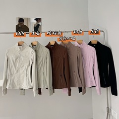 021001春の新型女性の経典百合は招待されて身を修めるタイプのヨガの服の運動の立襟のジャケットのコートを着ます。