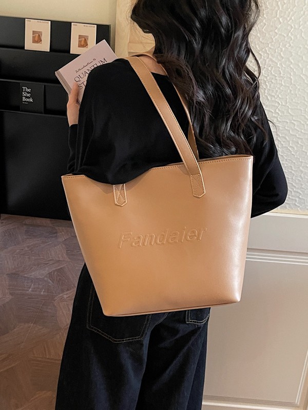 Casual gran capacidad bolso tote para mujeres 2026 venta caliente nueva ciudad simple moda versátil bolso de hombro axilar