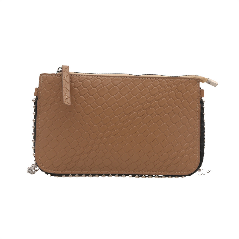 Diseño de moda bolso de hombro tejido estilo occidental color sólido 2025 nuevo temperamento retro fresco textura de axila bolso de mensajero