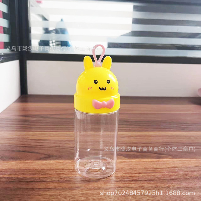 Lindo en forma especial de dibujos animados lindo conejo botella de embalaje de plástico PET grado alimenticio caramelo de barro soluble en frijol sellado fábrica tarro lote