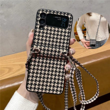 适用三星ZFlip5折叠屏手机壳斜跨绳格纹ZFlip6全包一体皮壳保护套