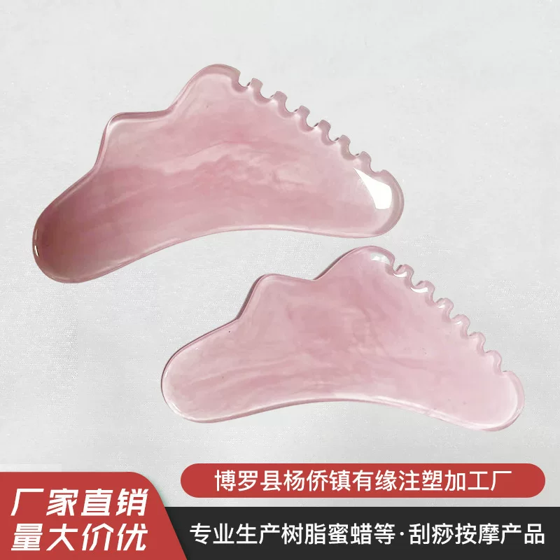 Fuchsia scalloped cosmetic handheld massager for face