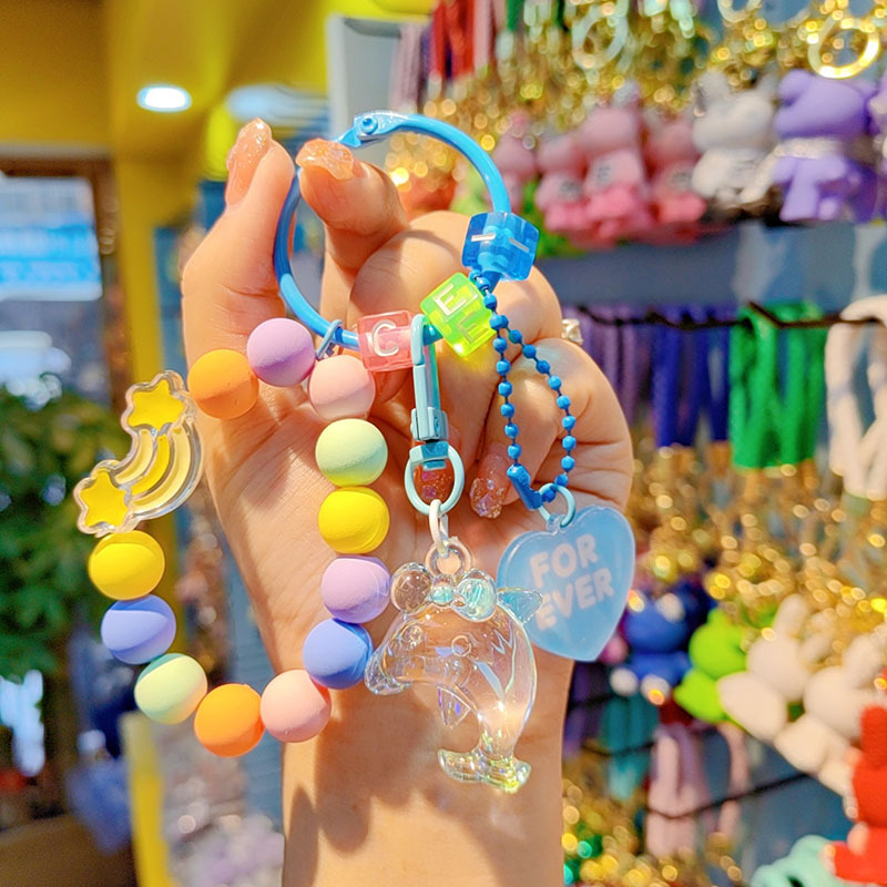 Nuevo acrílico delfín cuentas llavero bolsos creativos colgantes pequeños regalos frescos de cuentas de color al por mayor