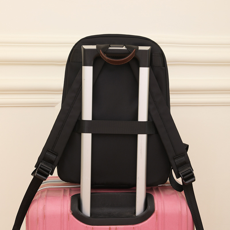 2023 nueva mochila de nailon casual para mujer, simple viaje de negocios, mochila para computadora de gran capacidad, mochila escolar al por mayor