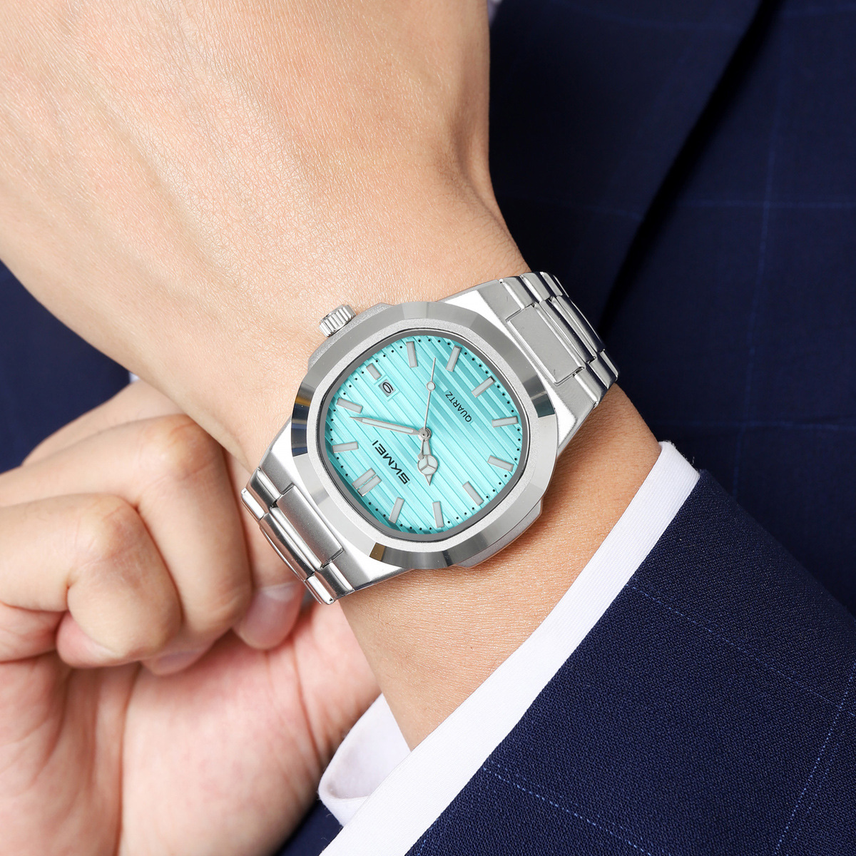 Momento de reloj de hombre de negocios de línea de acero nocturna calendario relojes de cuarzo relojes de comercio exterior transfronterizos fabricantes de reloj al por mayor