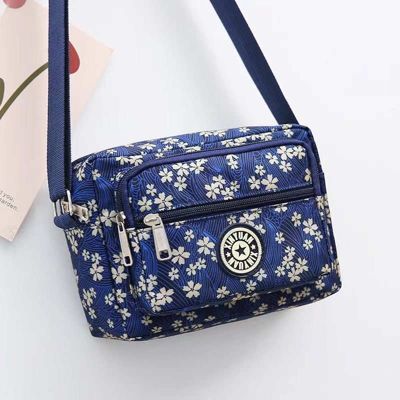 Bolsa de tela de flores bolsa de mensajero de las mujeres nueva bolsa de Madre de gran capacidad bolsa de hombro individual de mediana edad y ancianos bolsa de tela Oxford bolsa