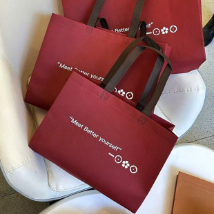 Advanced sense handbag manufacturers long portable non-woven bag custom printing clothing shopping bag custom environmental protection bag