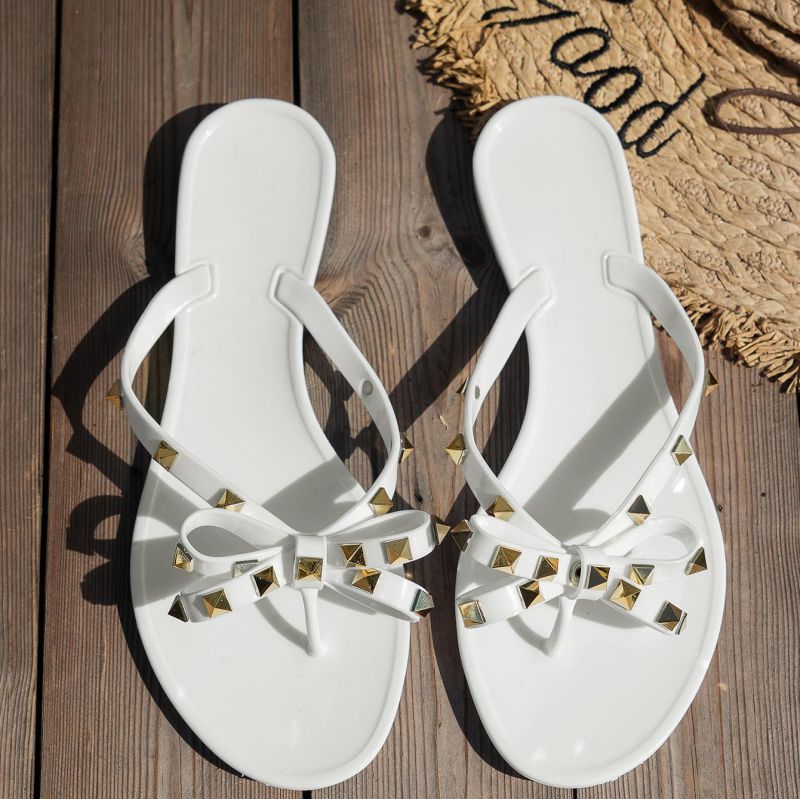 Infradito donna estive con fiocco e borchie per spiaggia e mare_voghion.com