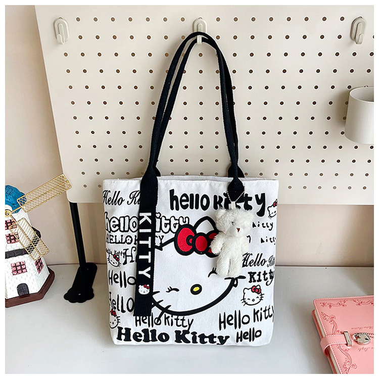 The new fashionable cartoon canvas bag, simple and versatile tote bag, cute commuting single-shoulder tote large bag, is selling well across borders undefined