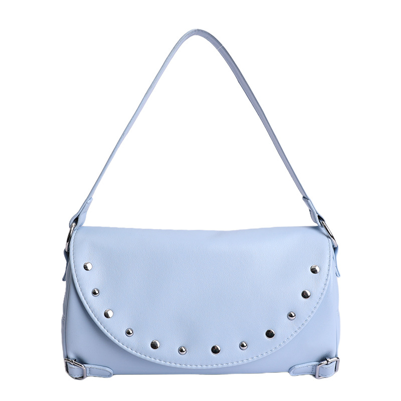 Texturas de moda primavera y verano retro bolsas de brazo 2026 nuevo estilo de este año popular remaches de hombro bolsas de tramo inclinadas