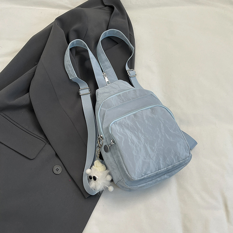 Nuevos productos de cuero suave pu doble uso bolso de pecho de moda de mujer impresión de tendencia nueva mochila china textura mochila pequeña