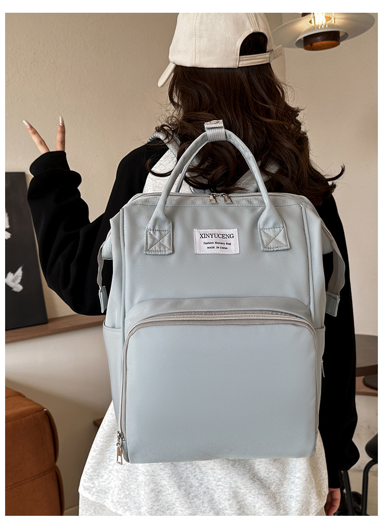 Solid-color lightweight mom bag, a backpack for taking kids out, multi-functional large-capacity mother and baby bag for girls undefined