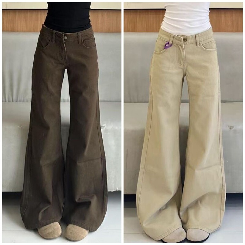 Korean-style washed denim jeans with a low waist, a slightly flared leg, a loose fit, and a floor-length design, creating a slimming effect Korean-style washed denim jeans with a low waist, a slightly flared leg, a loose fit, and a floor-length design, creating a slimming effect